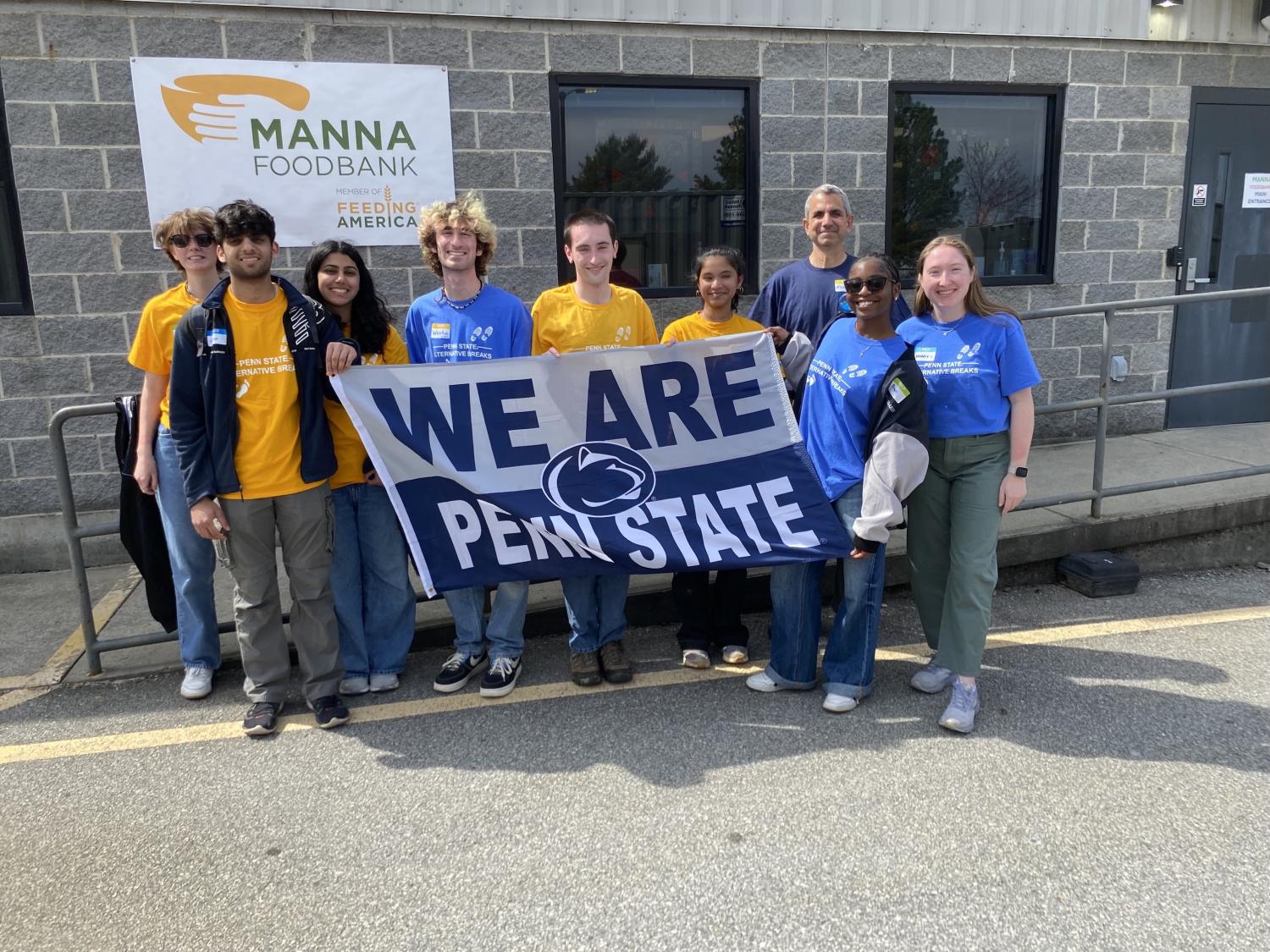 Penn State Alternative Break students in front of food bank where they worked over spring break. 