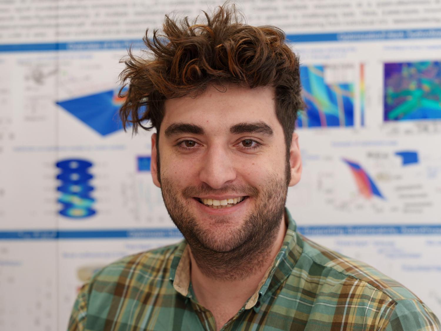 A professional headshot of an individual