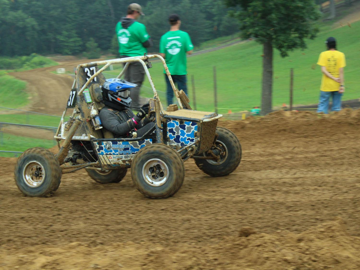 Brian P. Rogers drives the Pennsylvania College of Technology car in the endurance race at Baja SAE Maryland.