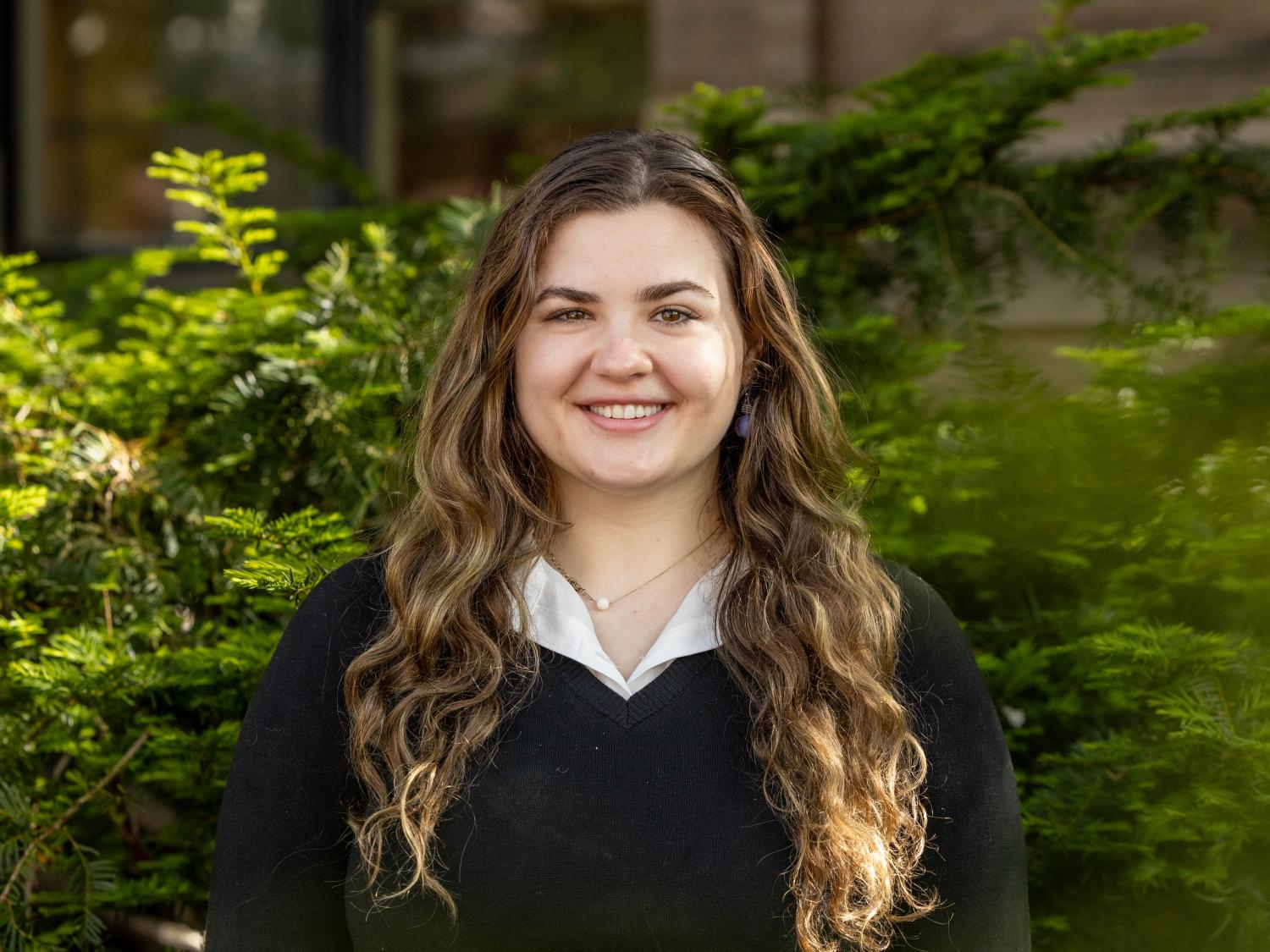 Maggie Day stands outside at Penn State University Park.