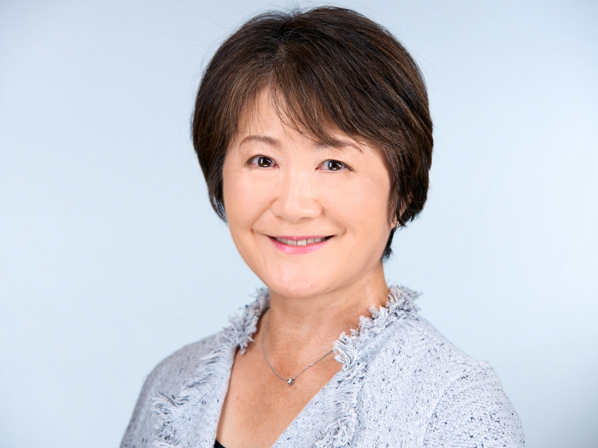 photo portrait of woman with short, straight black hair