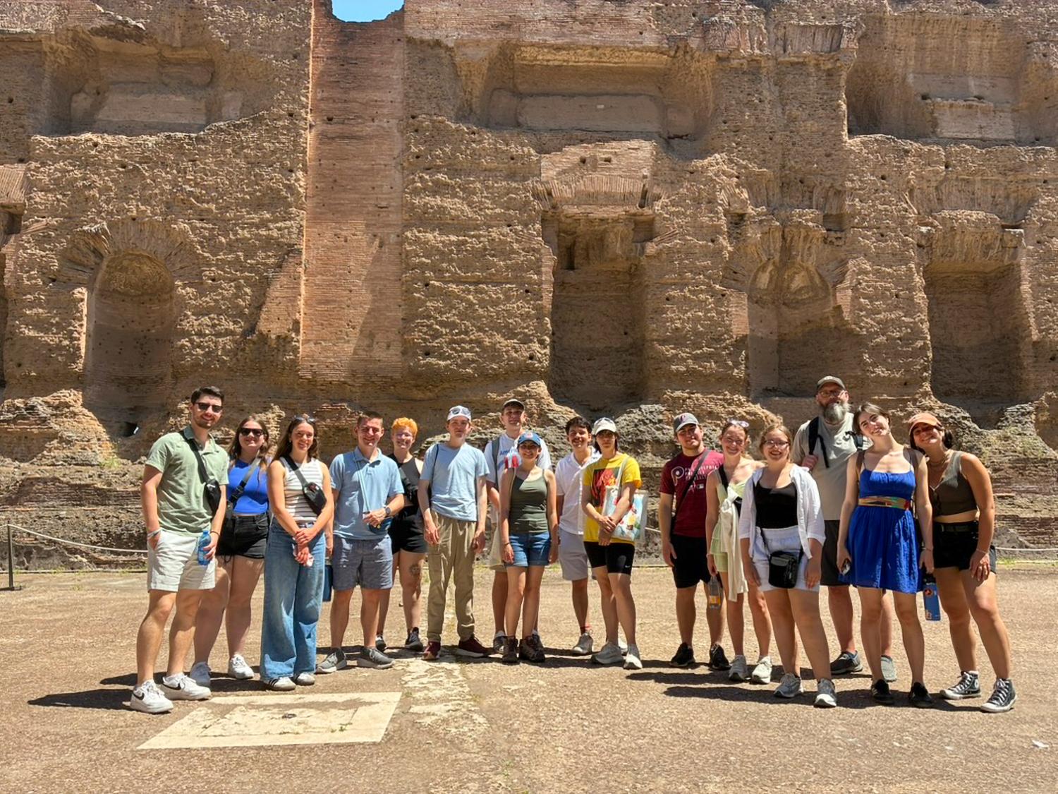 Students standing at the Baths of Caracalla in Rome.