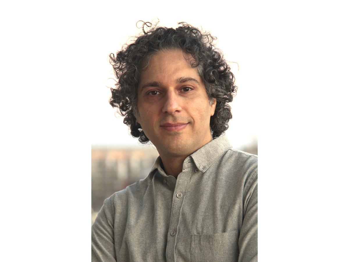 headshot of acclaimed writer ali araghi