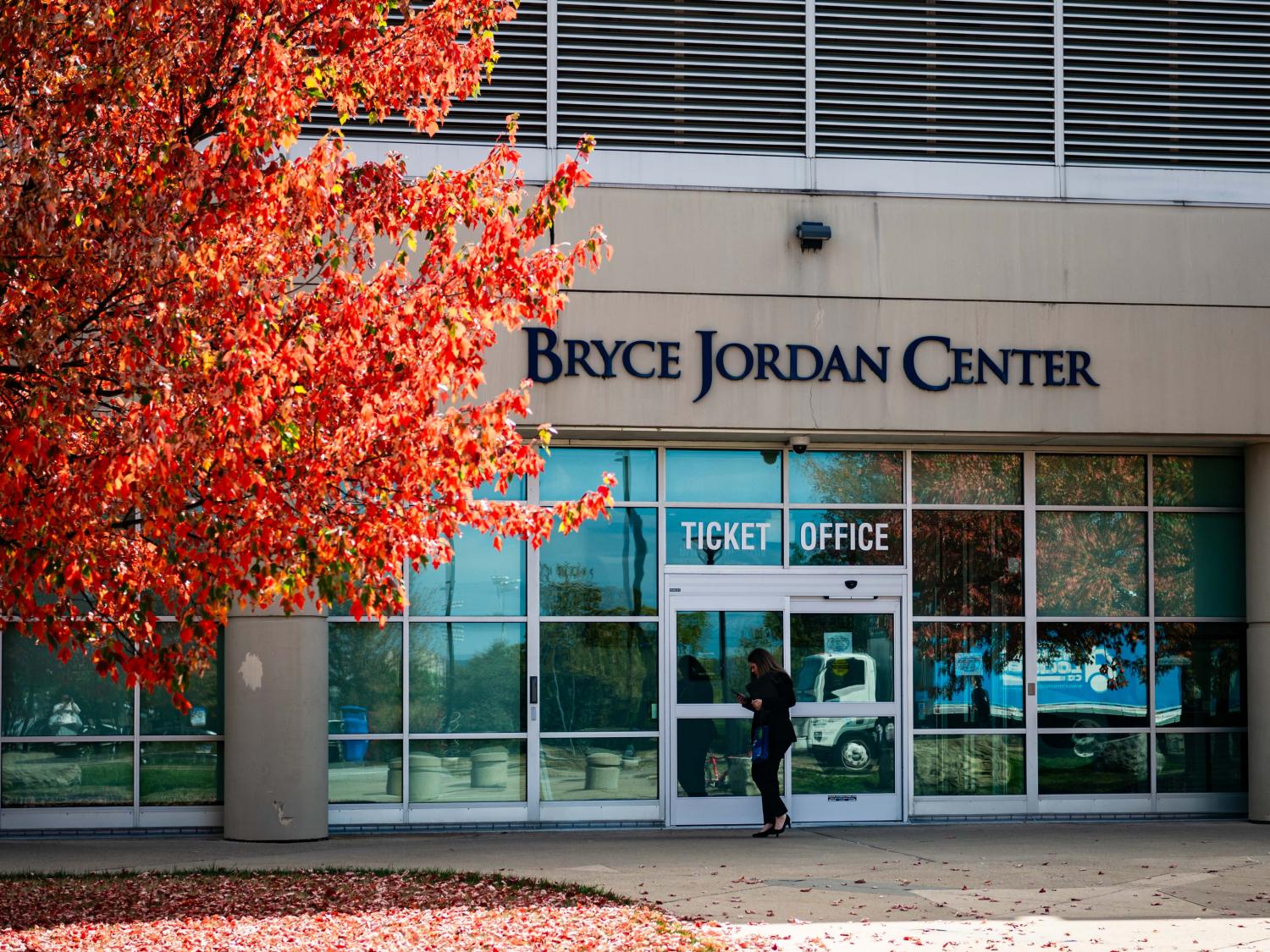 A person walks by Bryce Jordan Center