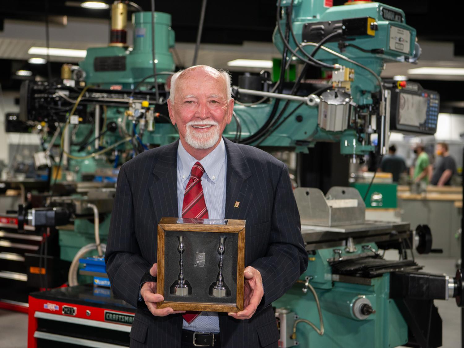 Larry Ward surrounded by engineering equipment