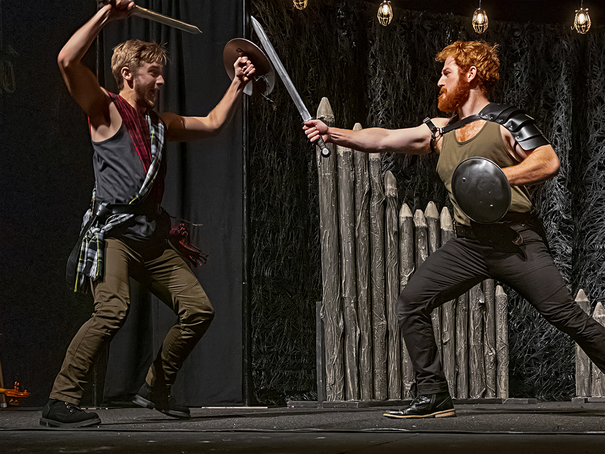 Two actors from the Linny Fowler WillPower Tour perform a sword fight scene from “Macbeth."