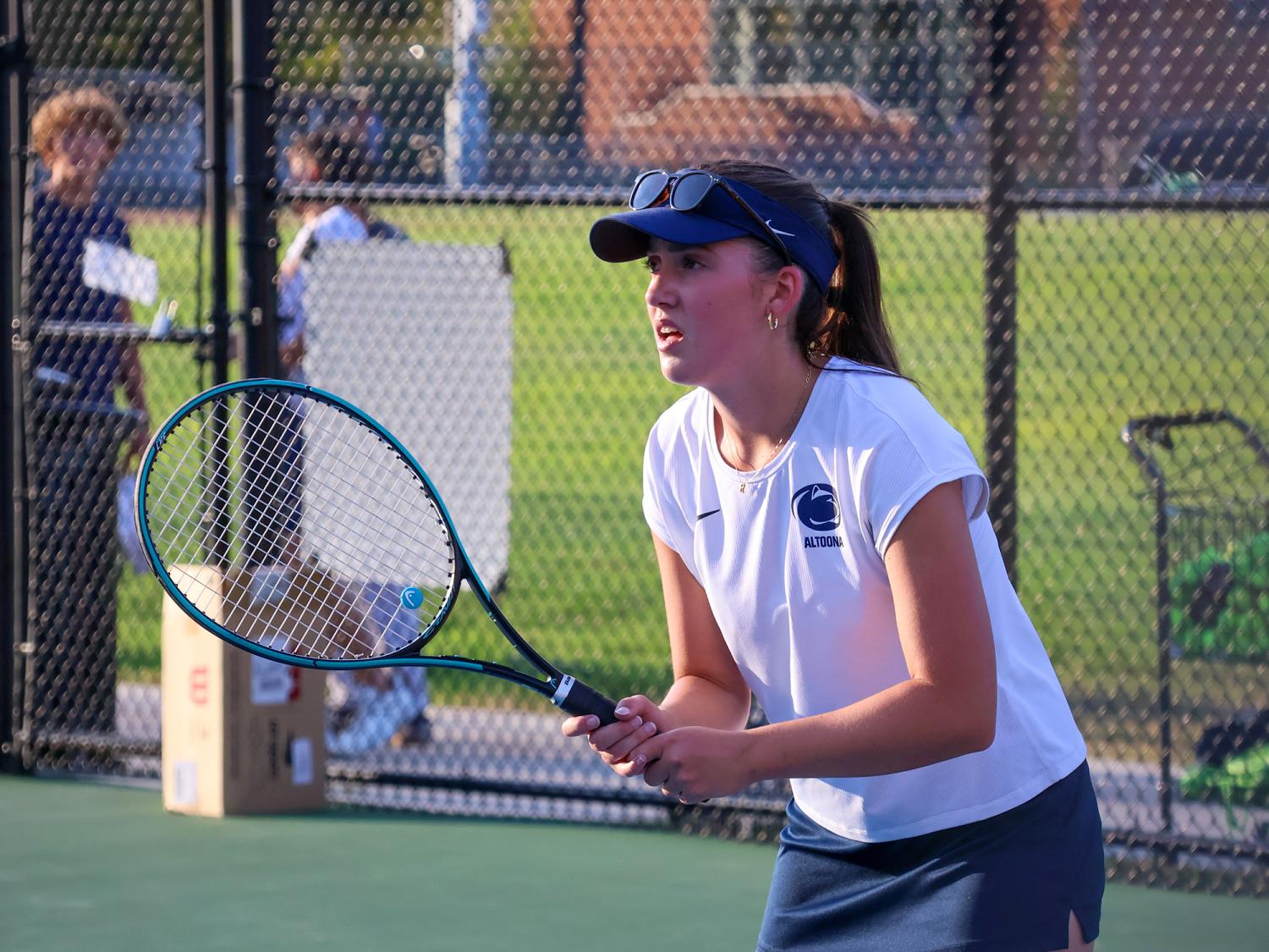 Rachel Stricek plays in a tennis match at Penn State Altoona
