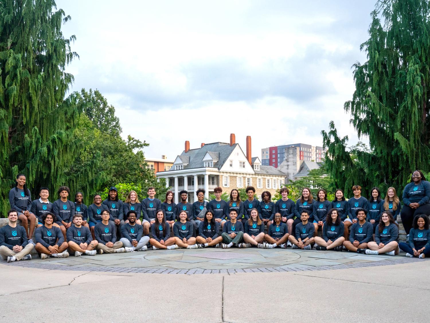 a group of students poses outside