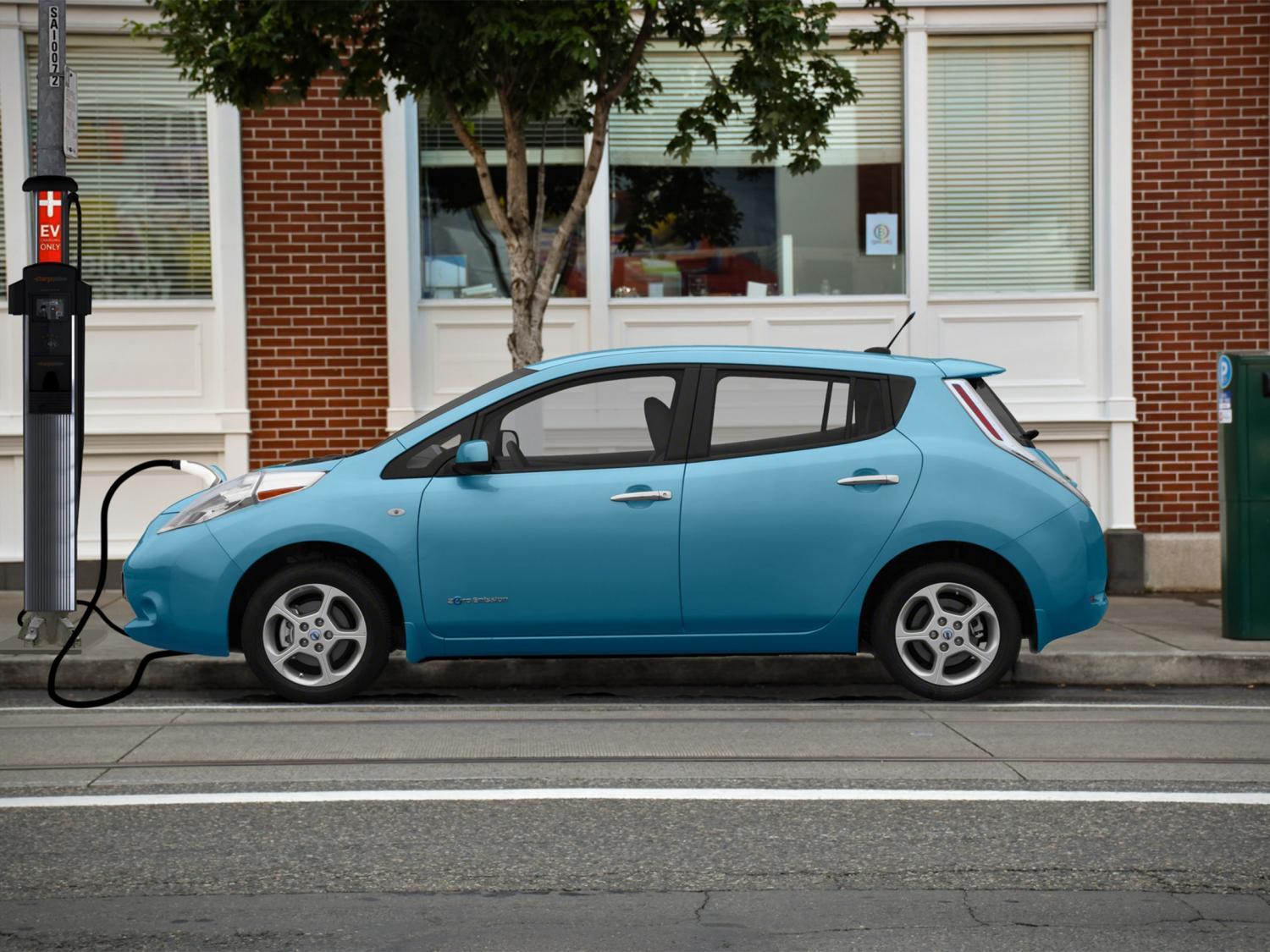 A car at an EV charging station