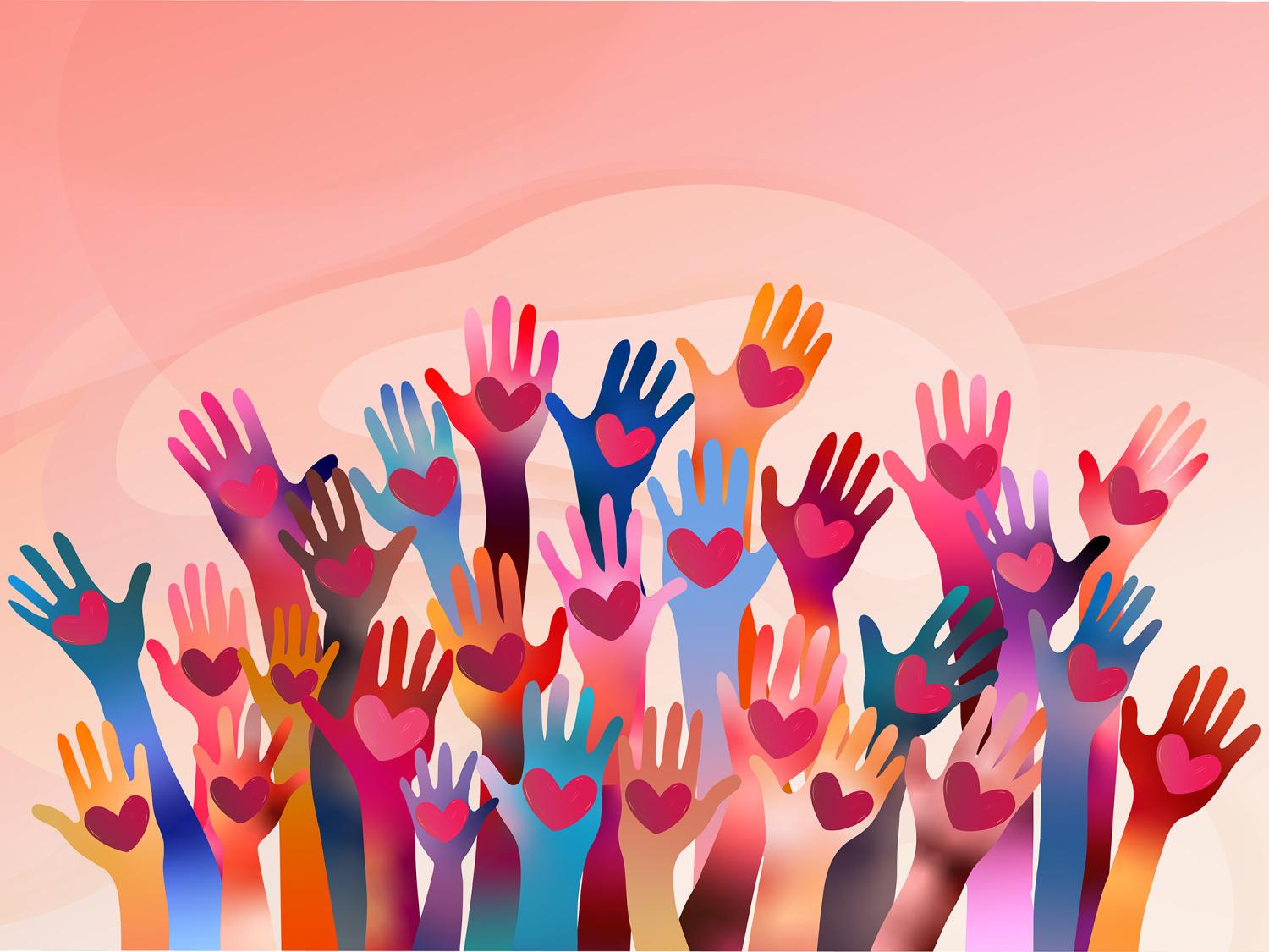 Colorful hands raised with hearts on their palms against a pink background, symbolizing unity, support, and community.