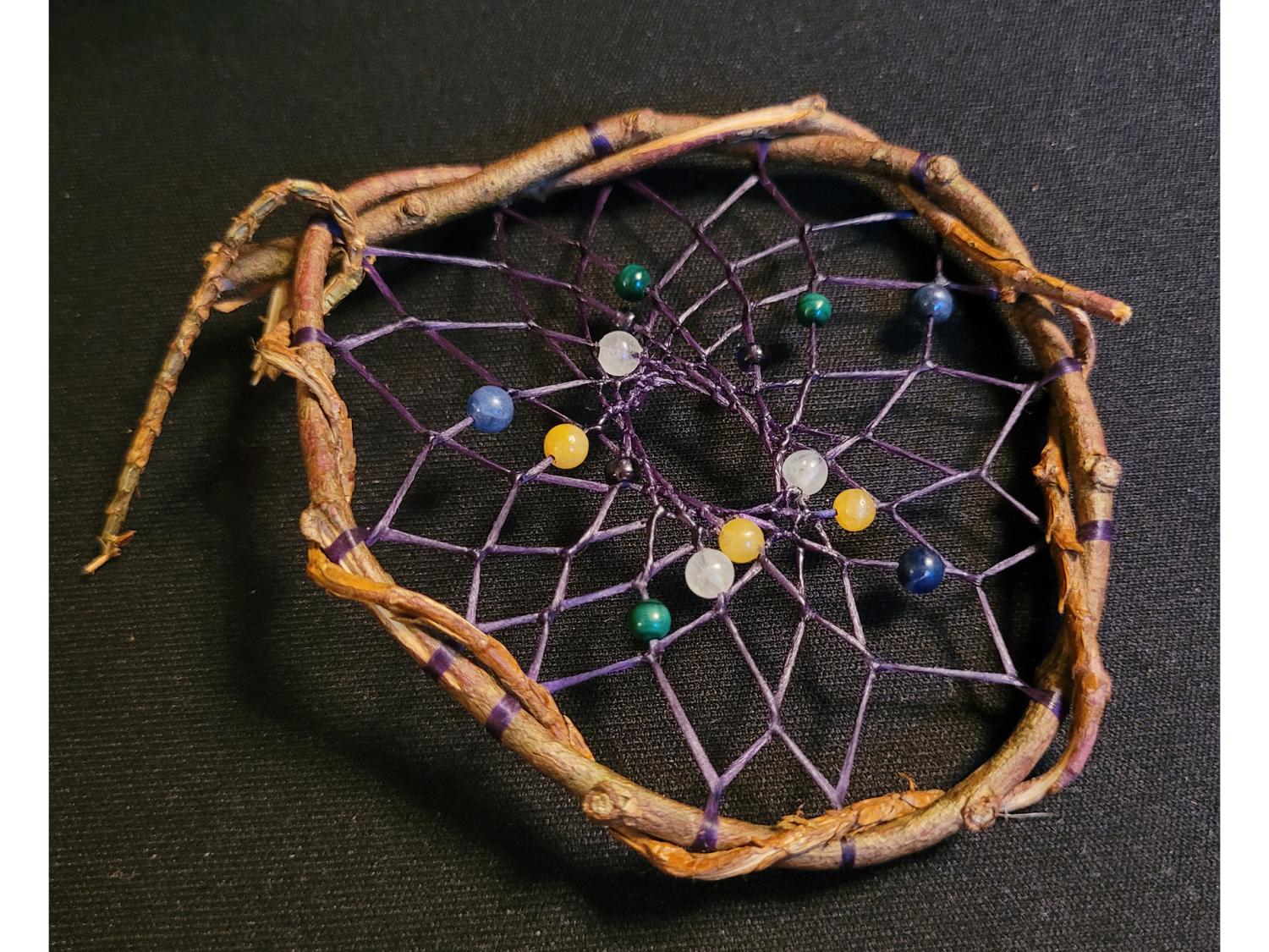 A pretty handmade dreamcatcher with gemstone beads
