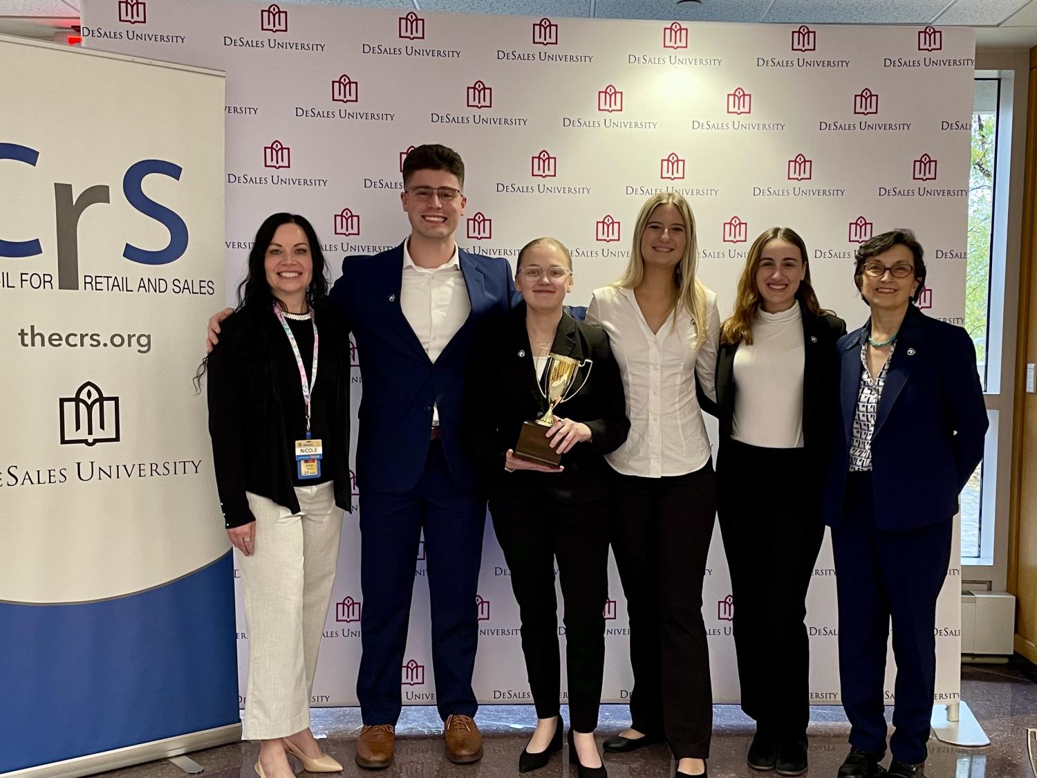 group of people standing together for a photo