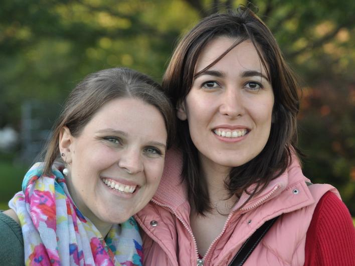 Two women smiling at the camera
