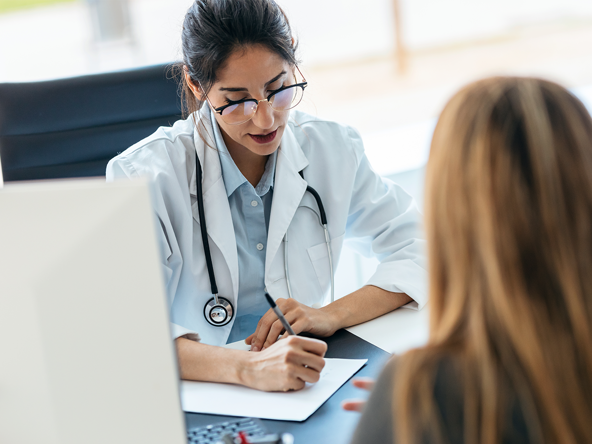 doctor consulting with a patient in office