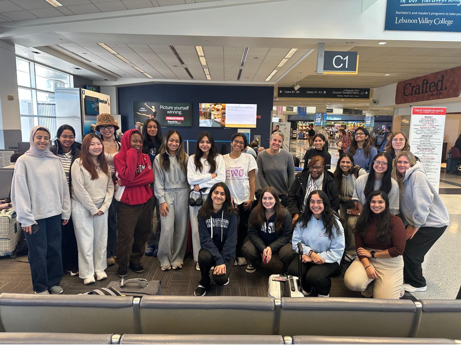 group of college students inside a bus station