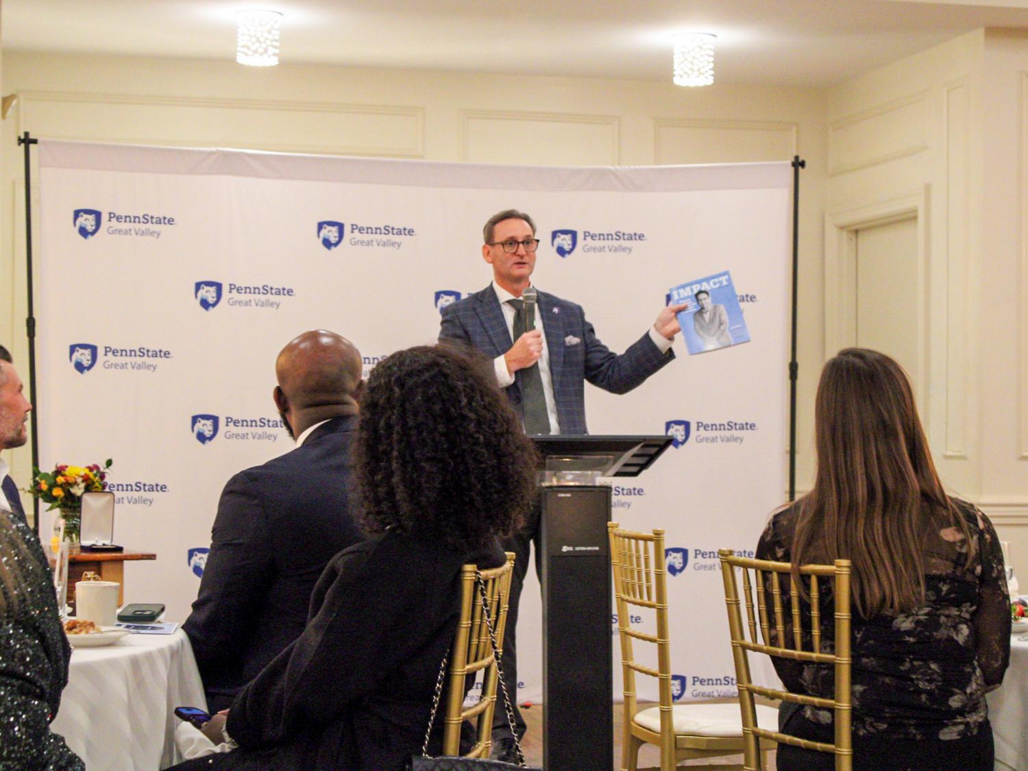 The Penn State Great Valley chancellor speaks to a group of donors and alumni at a dinner.