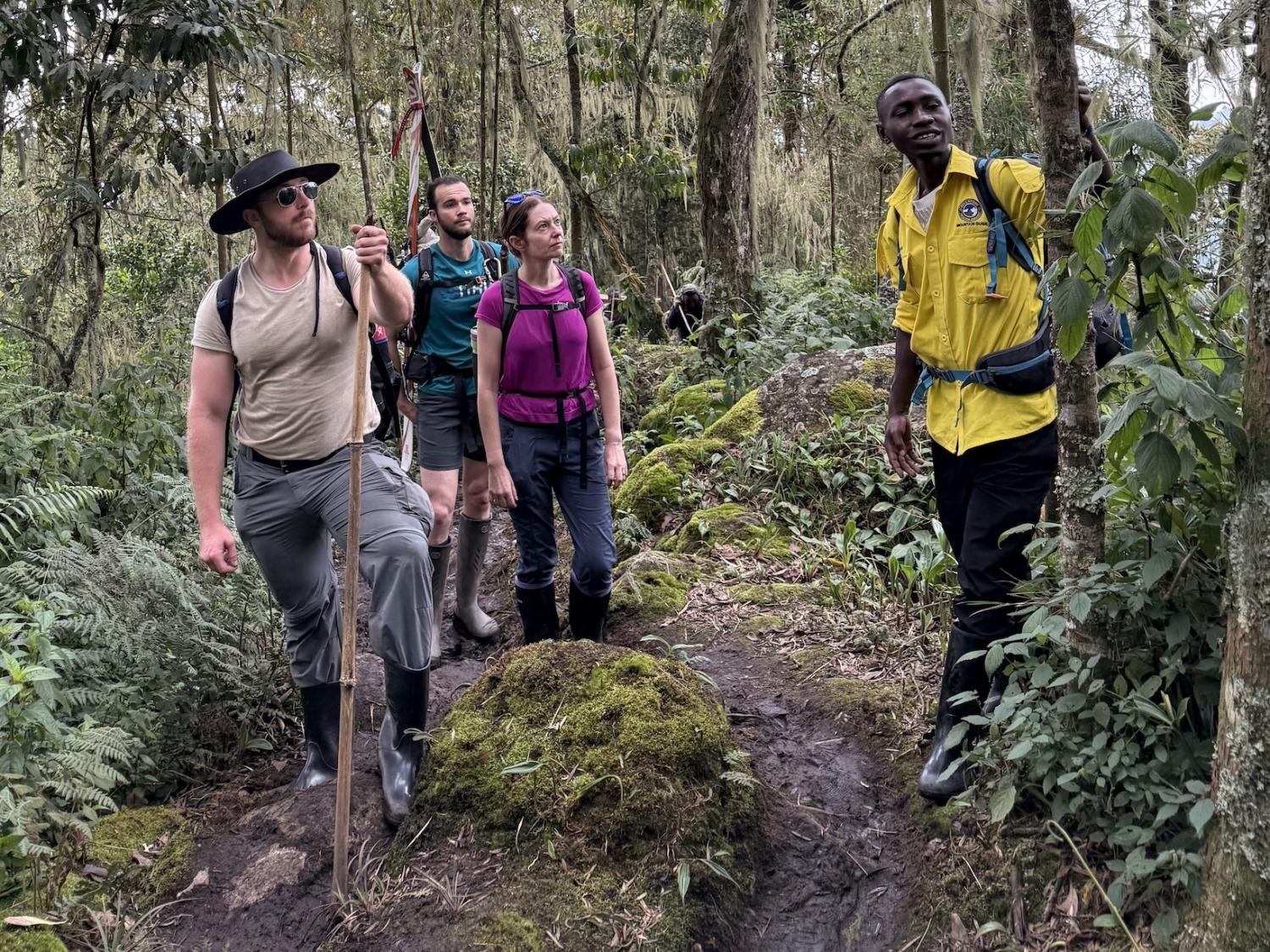 A group of collaborators including Penn State faculty member Sarah Ivory, center, is photographed on the second day of a three-day trek near Kilembe village, Uganda, on June 26, 2025.