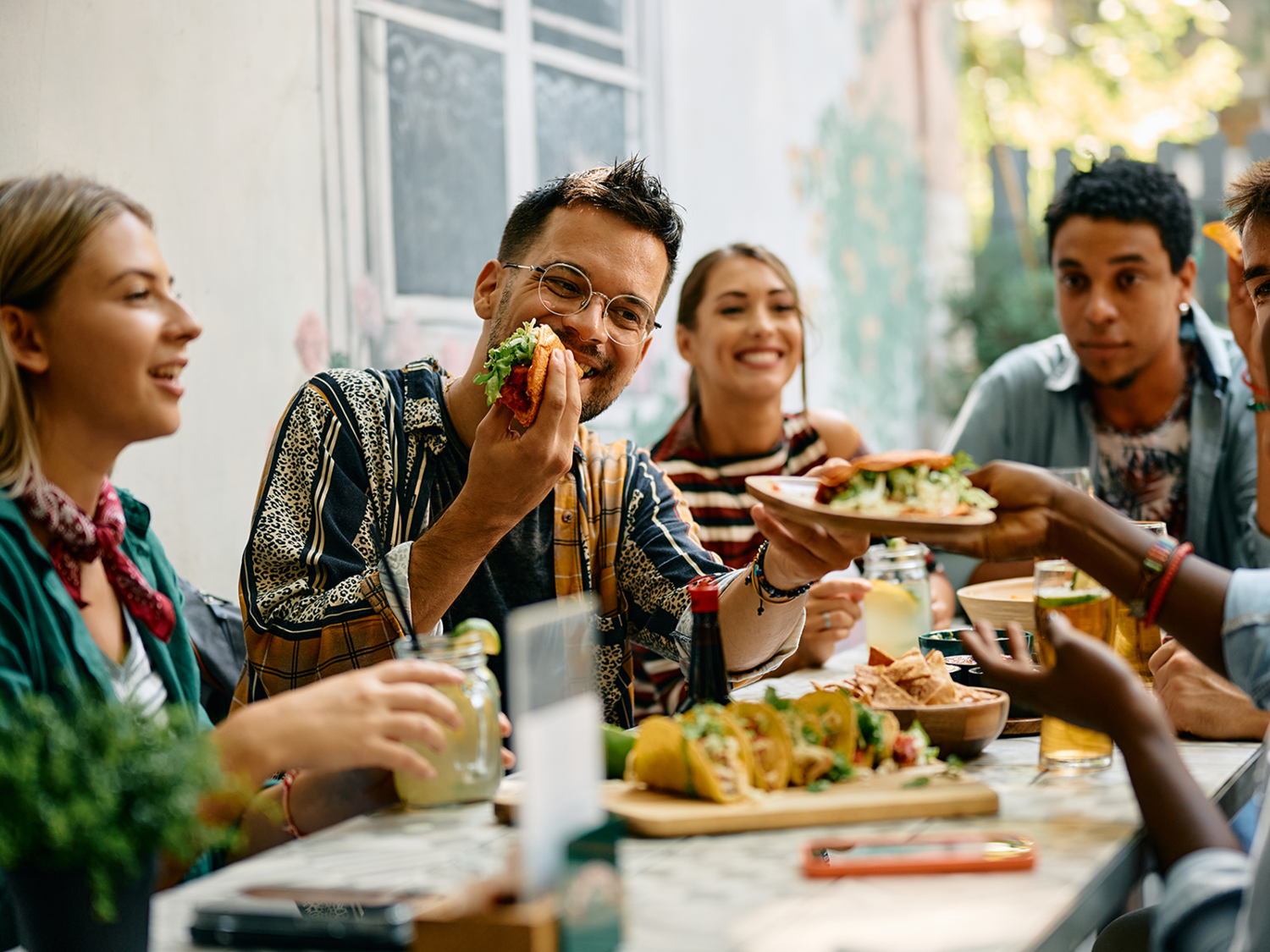 People eating a meal at a table