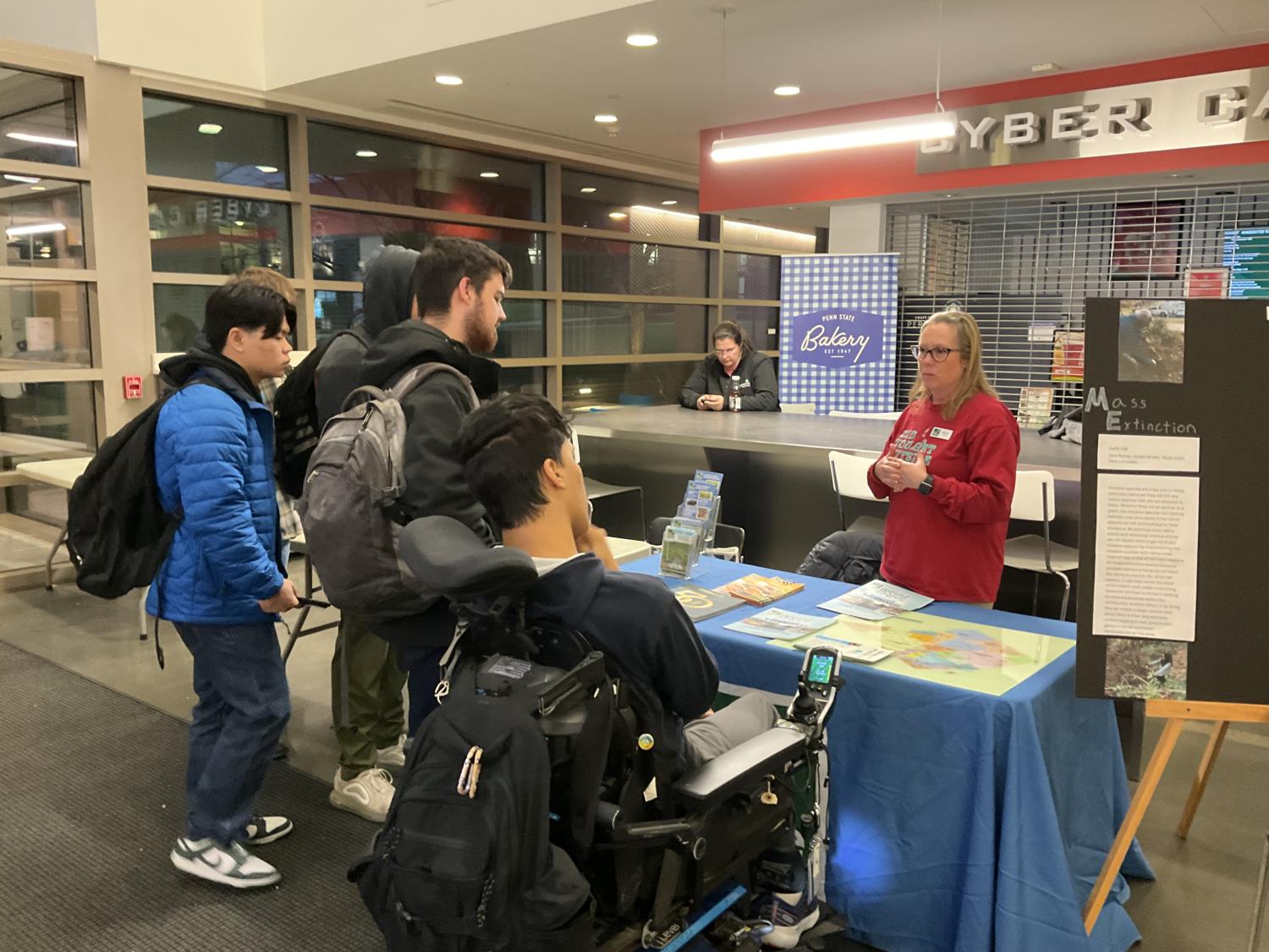 A group of students talk with community partner at Sustainability Expo.