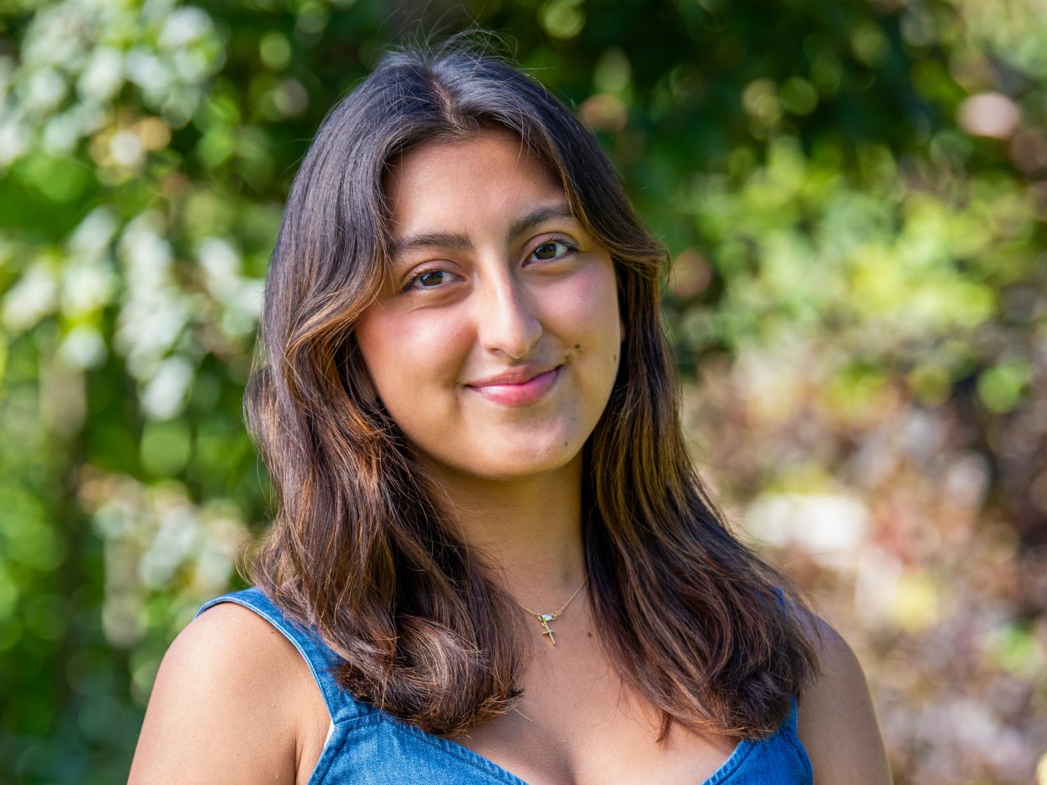 Delany Moreno stands in front of a tree at Penn State University Park.