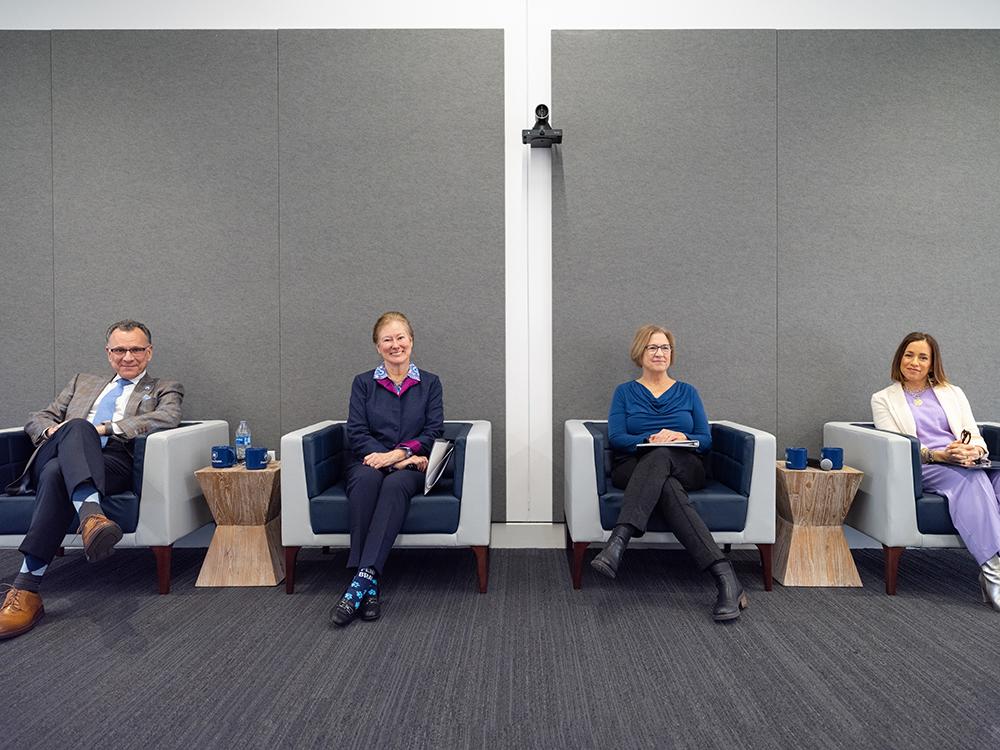 Group photo of leaders sitting in chairs