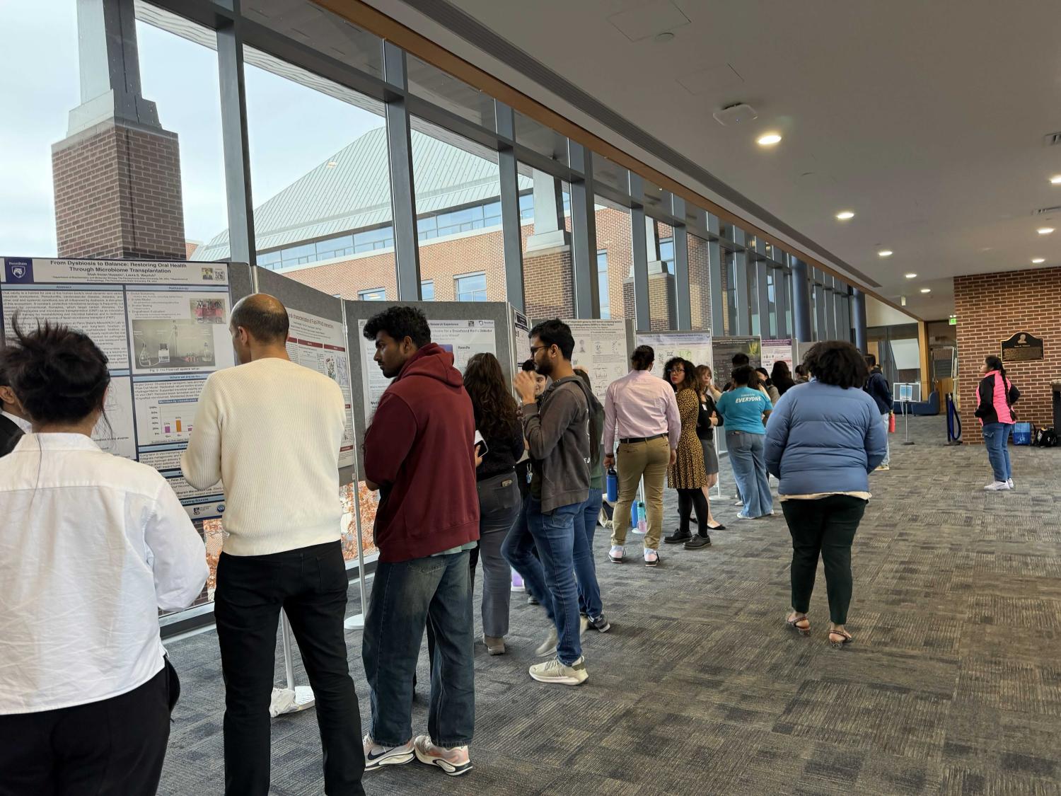 Group of people presenting at the Eberly Research Showcase.