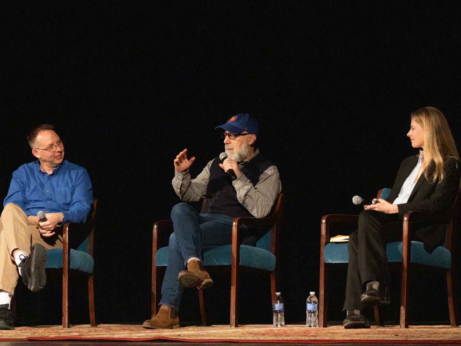 Jason Wright, Adam Frank and Nadia Drake sit on stage