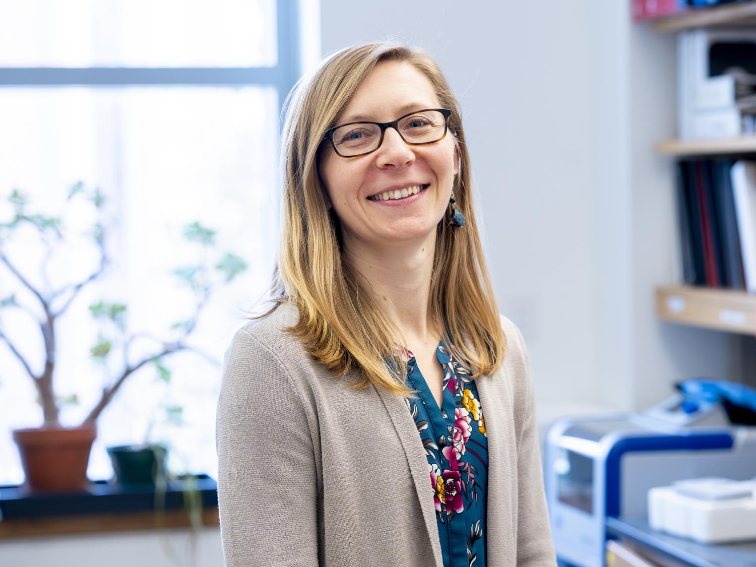 Person smiles at the camera. 