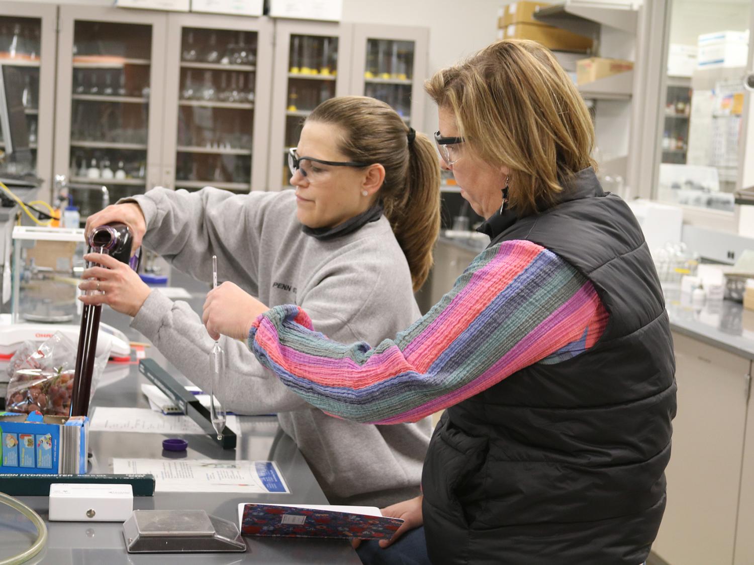 Students working in the lab as part of winemaking certificate program
