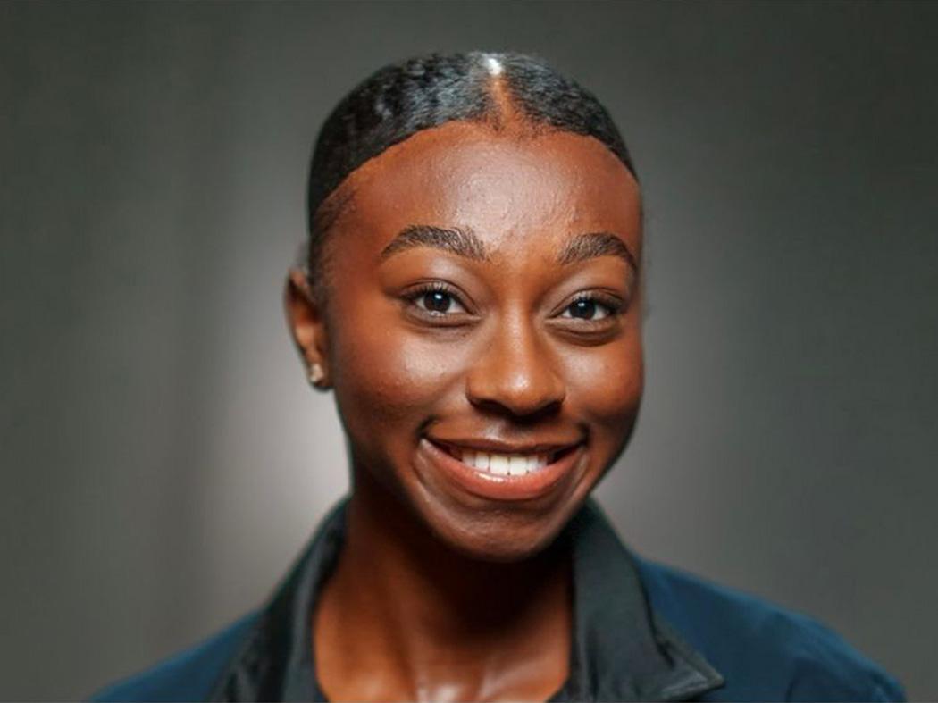 Smiling woman with dark haired woman 