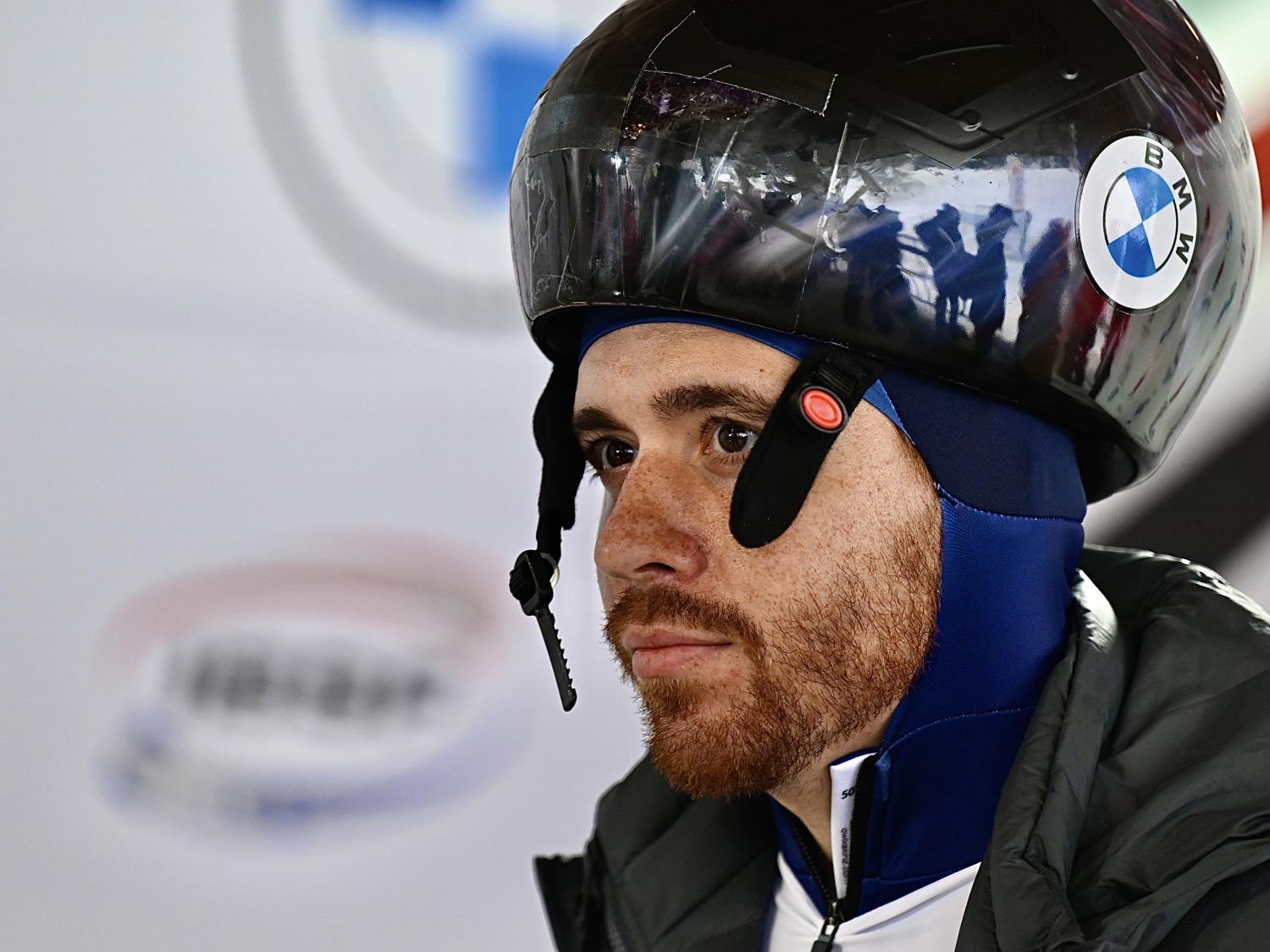 a man with a reddish beard wearing a helmet