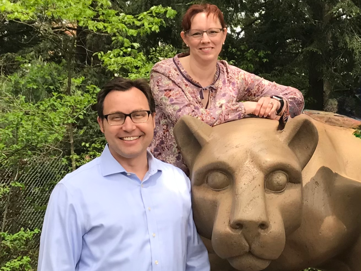 Mike Waldhier and Carrie Marcinkevage stand with the Nittany Lion Shrine