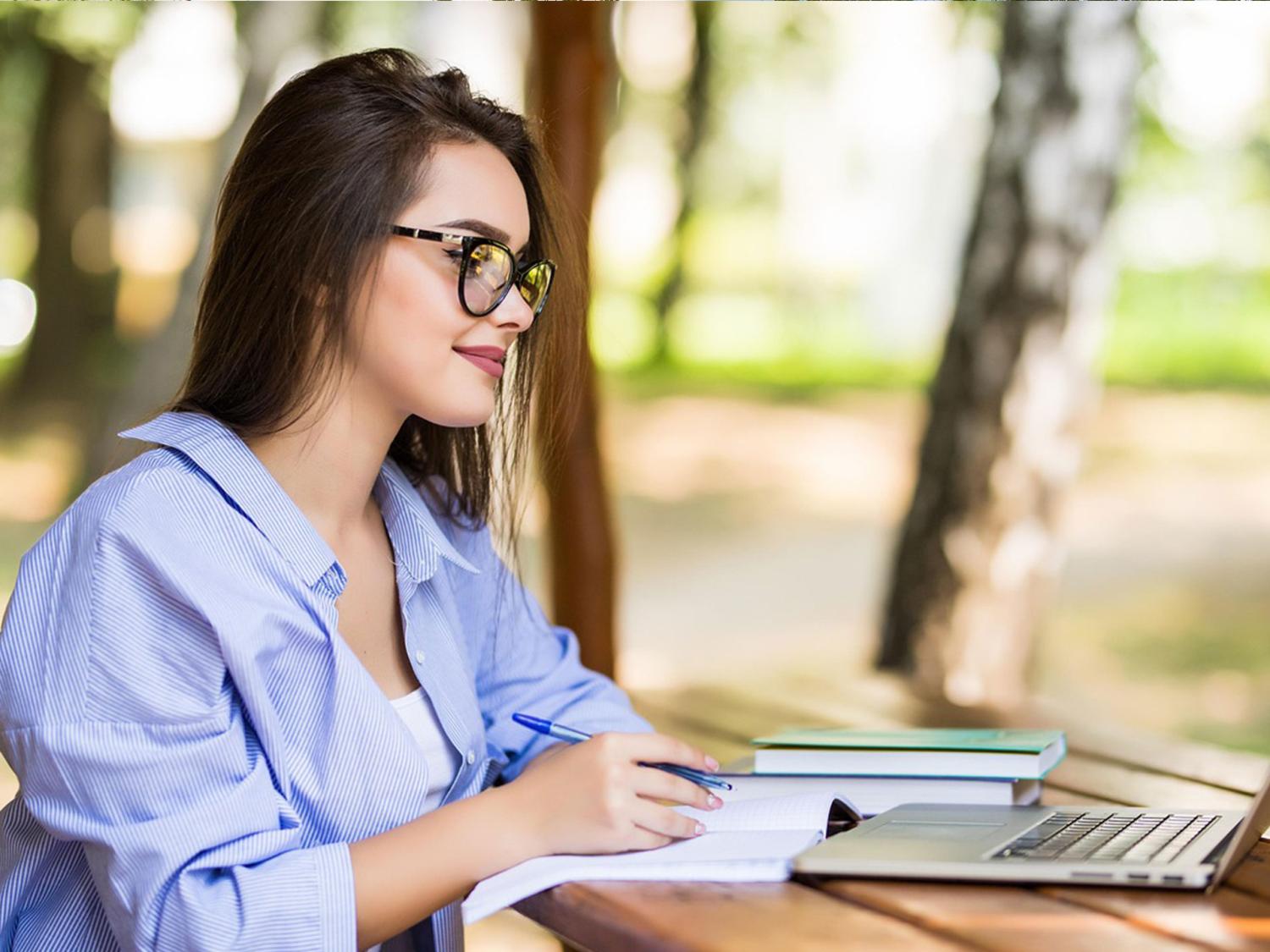 young woman looking at a computer