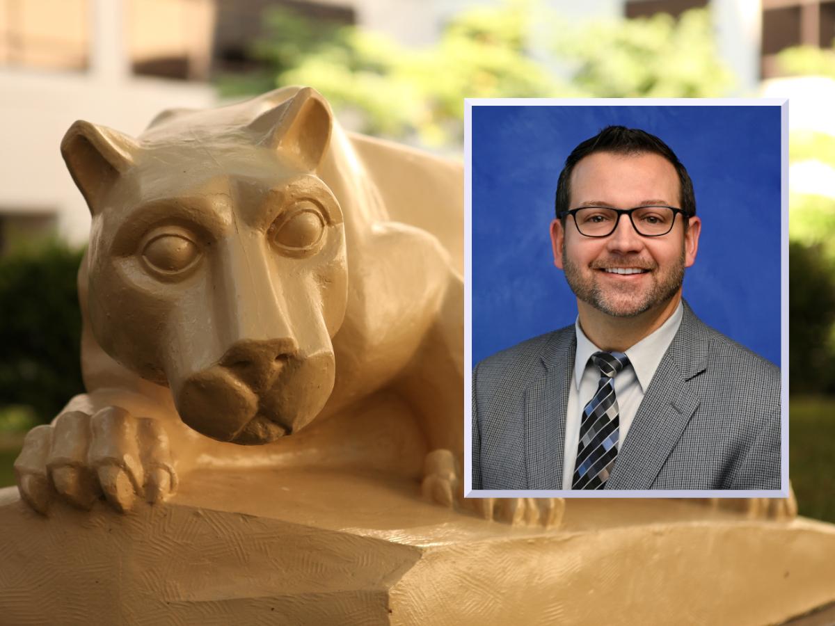 A professional headshot of Joseph Wysock, wearing a suit and tie, is superimposed over an image of a Penn State Nittany Lion statue.