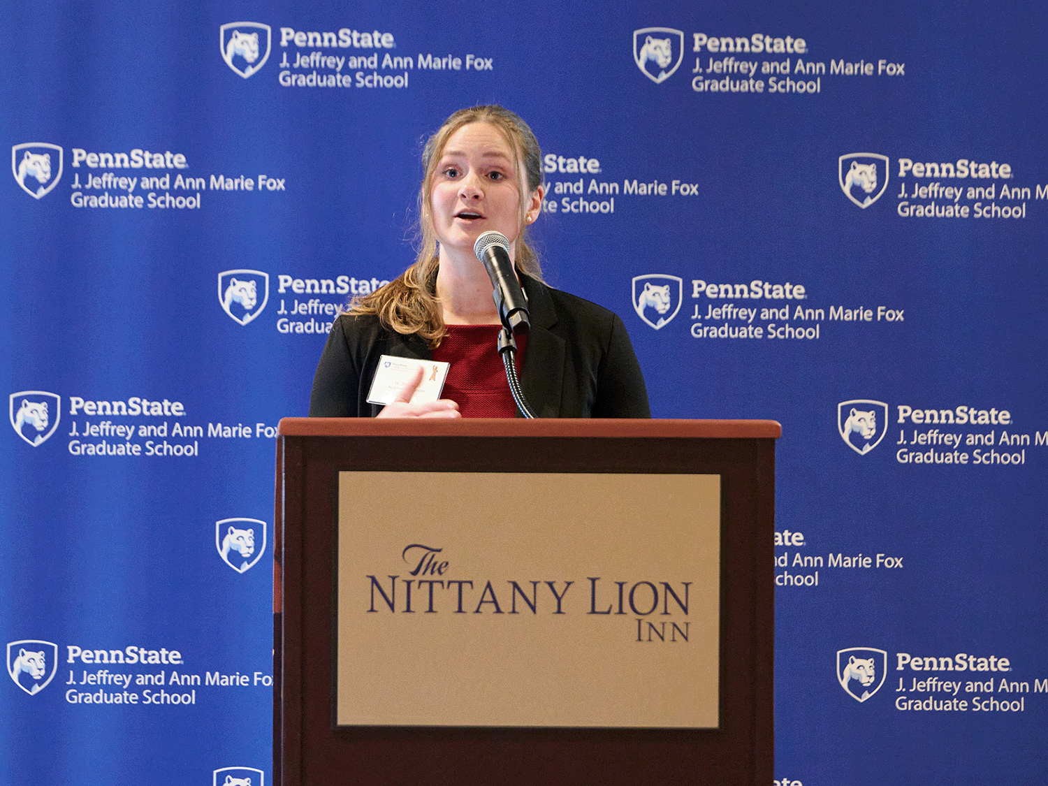Tricia Hart, the winner of Penn State's 2024-25 Three Minute Thesis competition, presenting during the final round of the competition