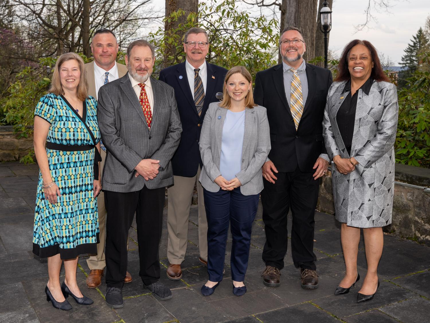 group photo of award recipients and the dean