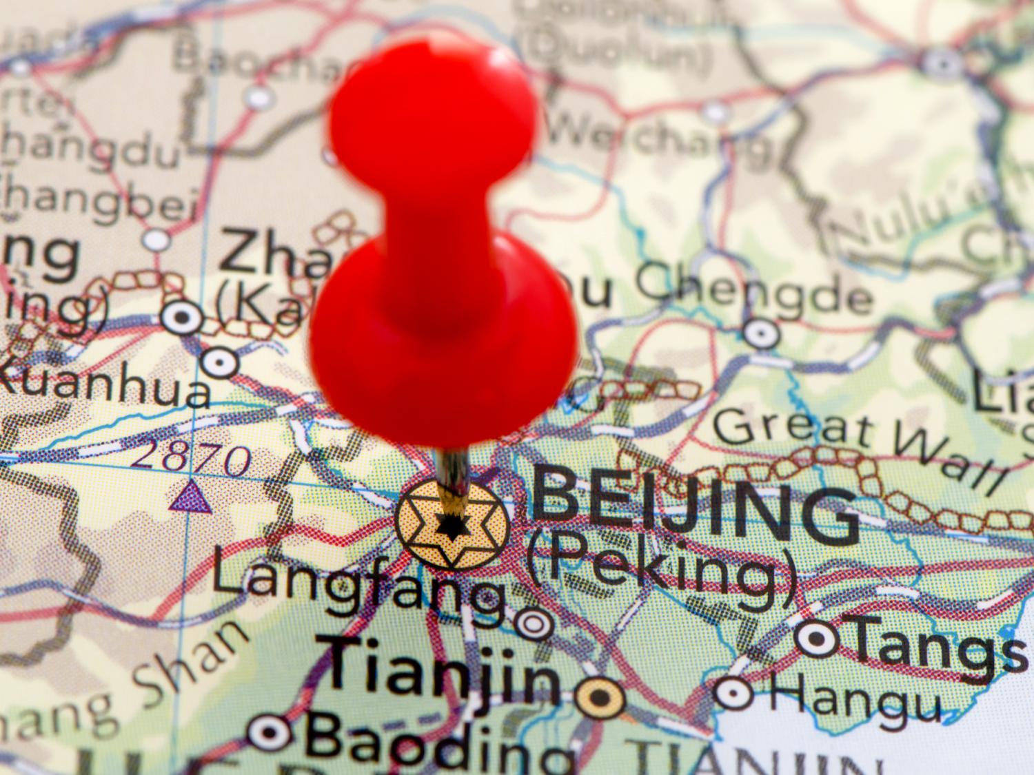 A map of China, focused in on a red thumbtack pinned in Beijing