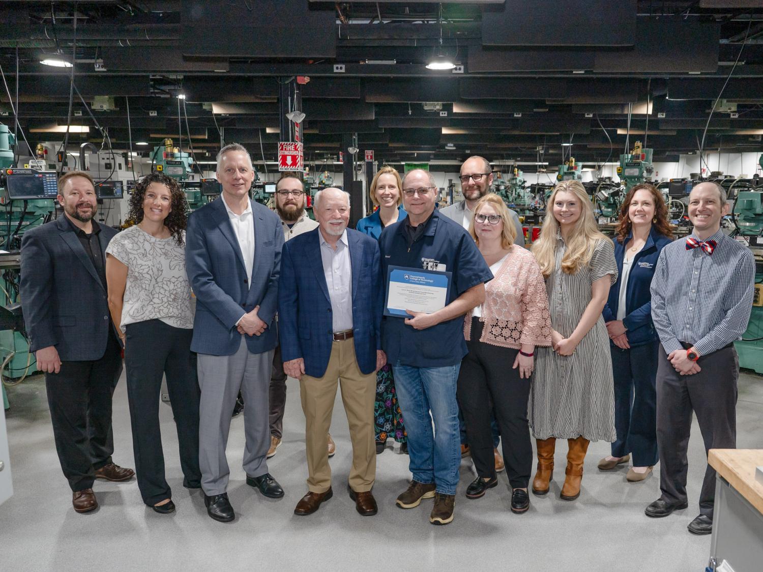 A group of people standing for a photo.