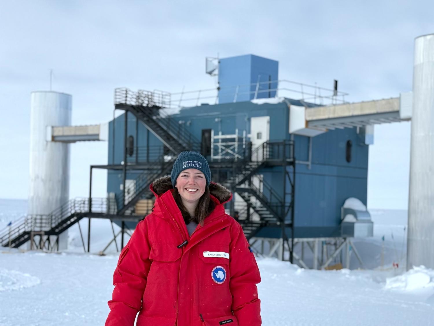 Kayla DeHolton in front of IceCube Observatory