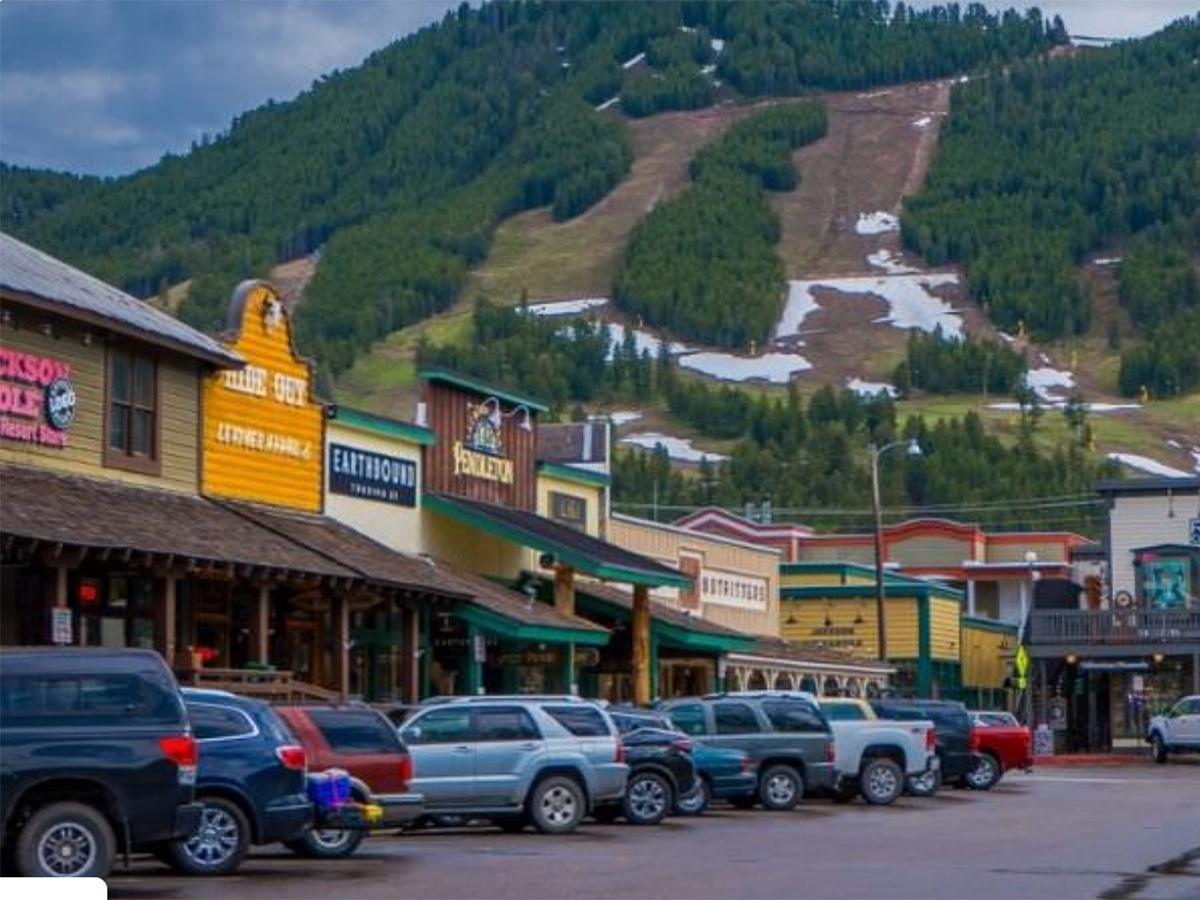 Downtown Jackson, Wyoming, near the Million Dollar Cowboy Bar, with the ski slopes of Snow King Mountain in the background.