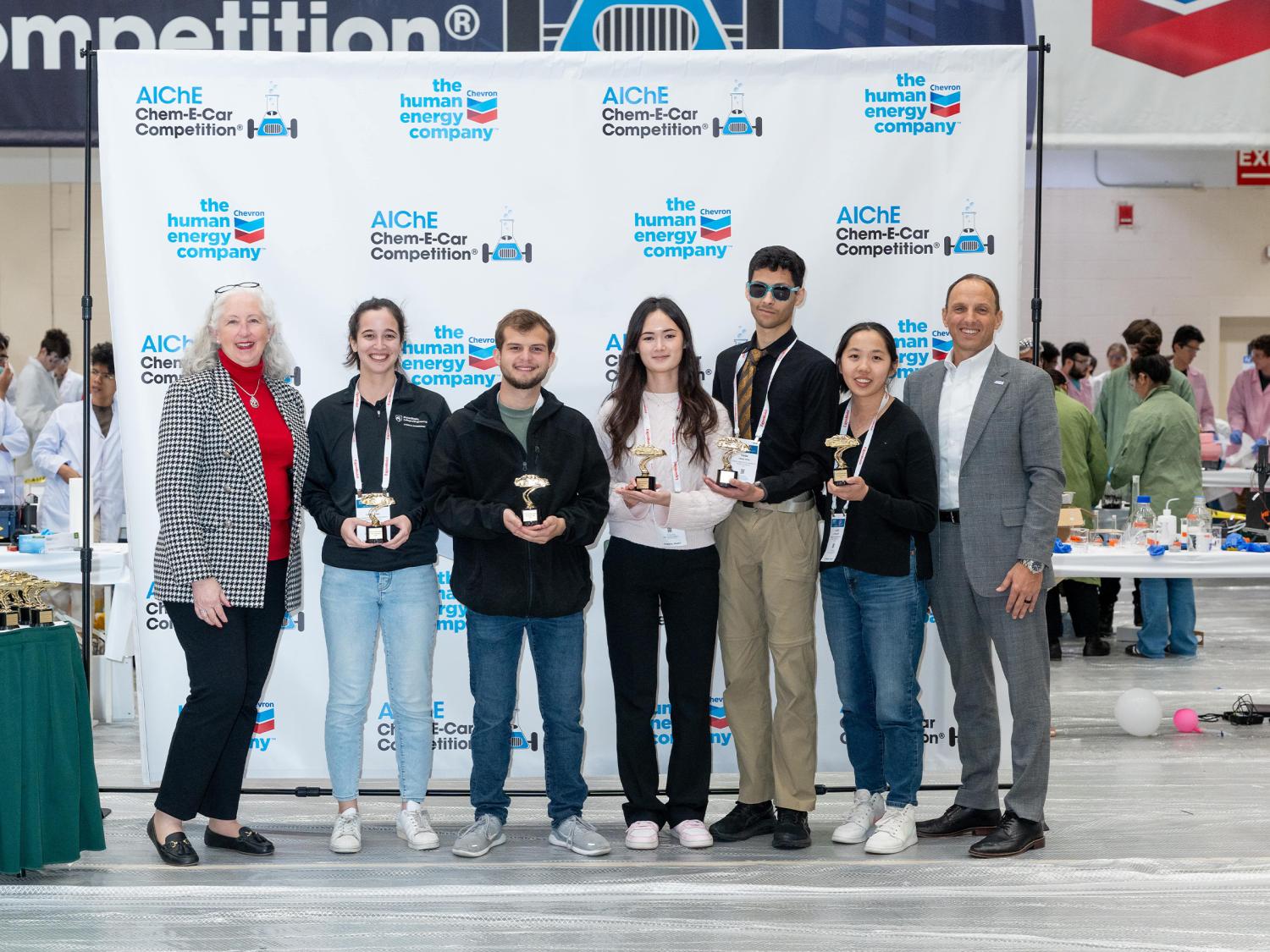 Penn State students posing with Chem-E-Car trophies