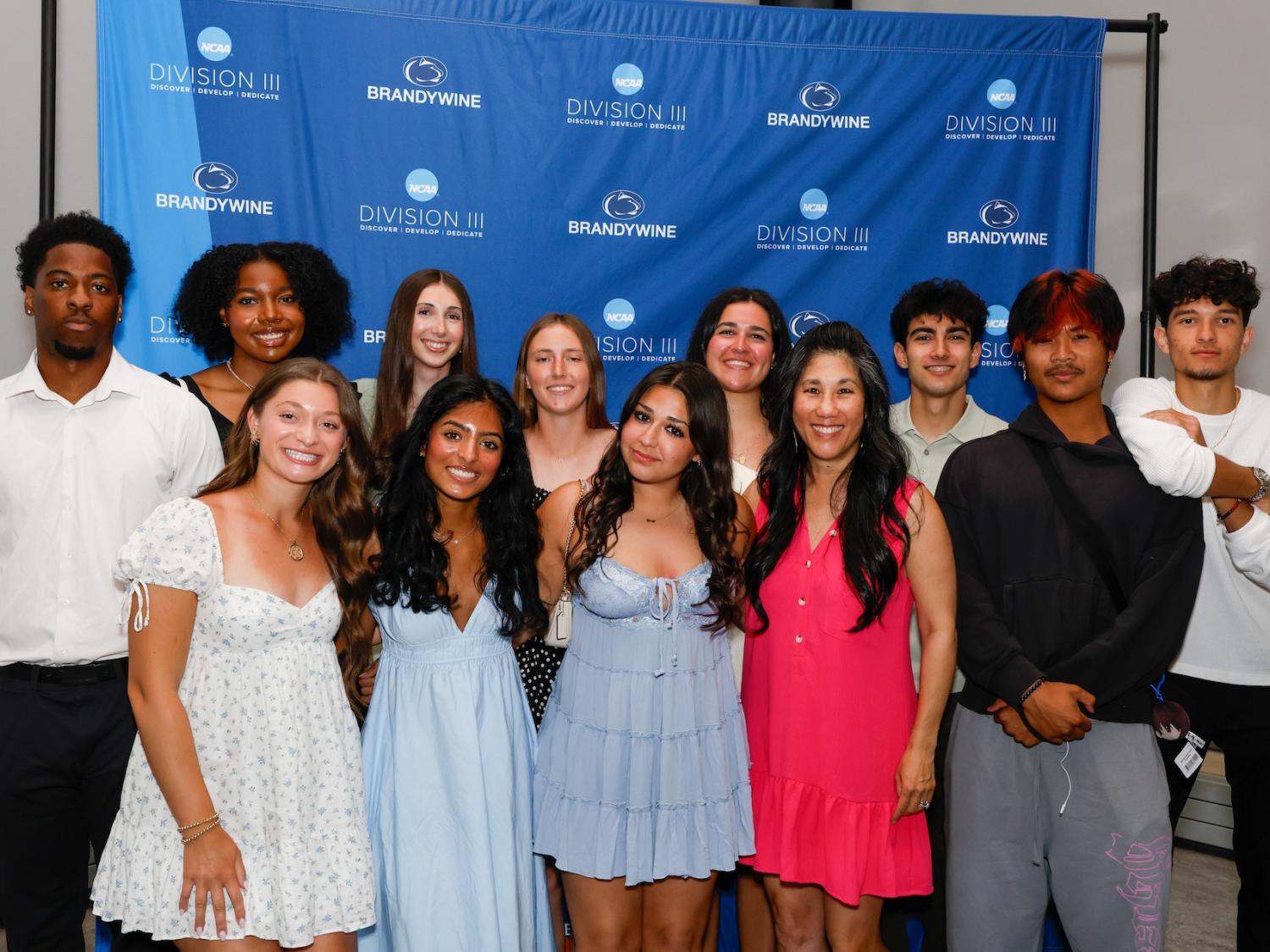 the tennis team in a group photo. 