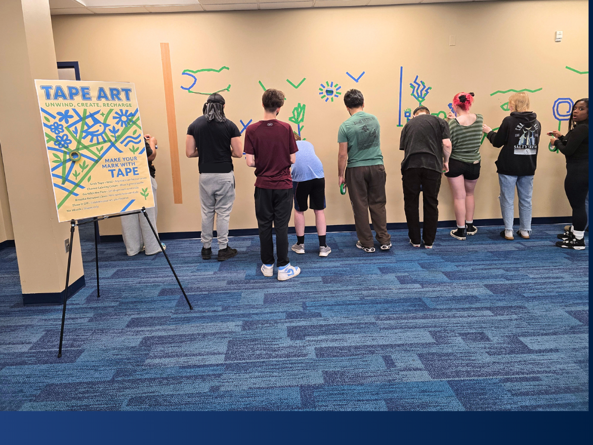 students create a tape wall mural at Penn State Lehigh Valley
