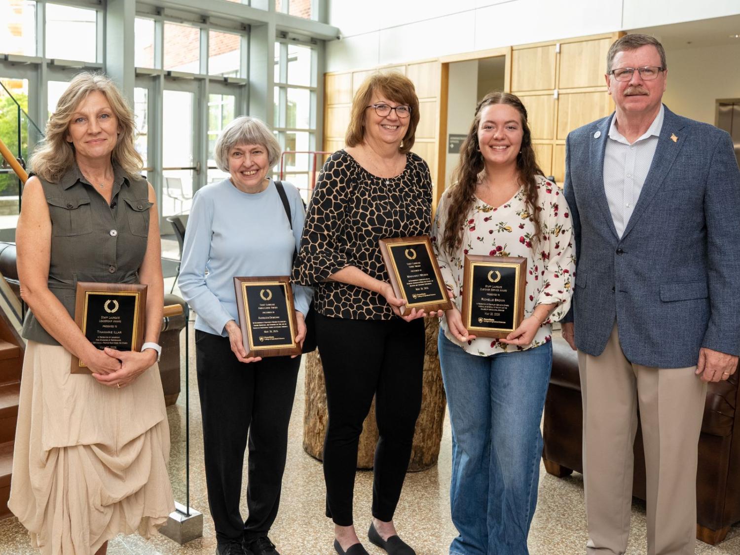 Staff receive awards from Troy Ott, dean of the College of Agricultural Sciences at Penn State.
