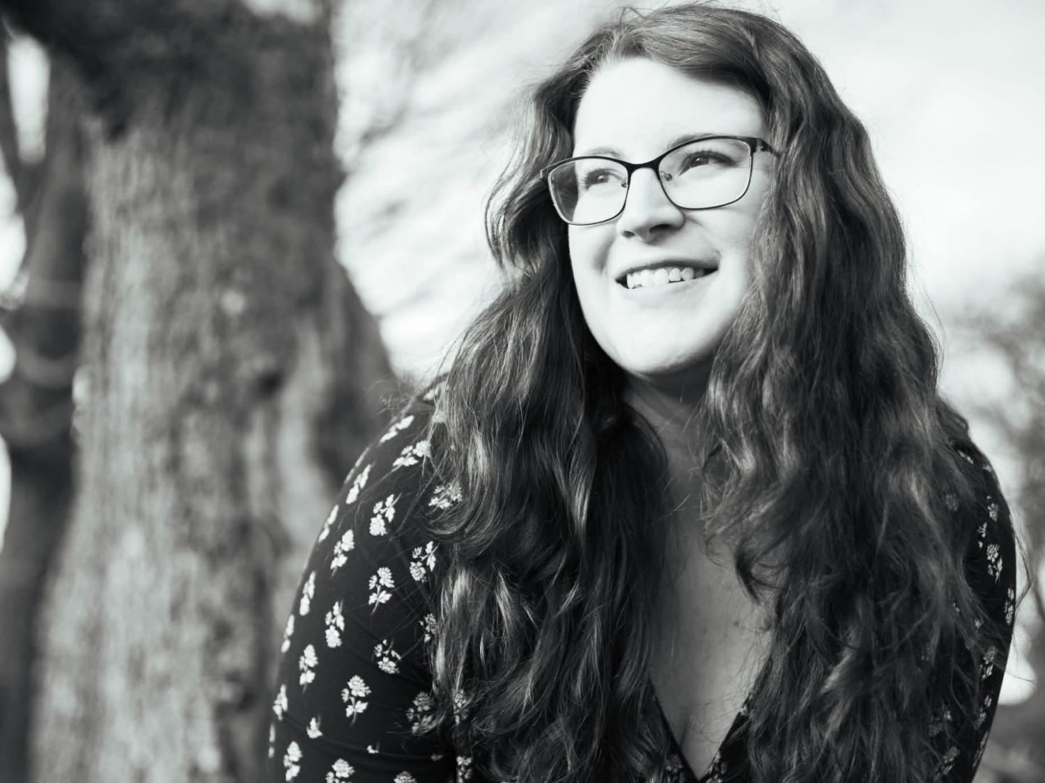 A black-and-white portrait of Penn State Behrend alumna Alexandria Long