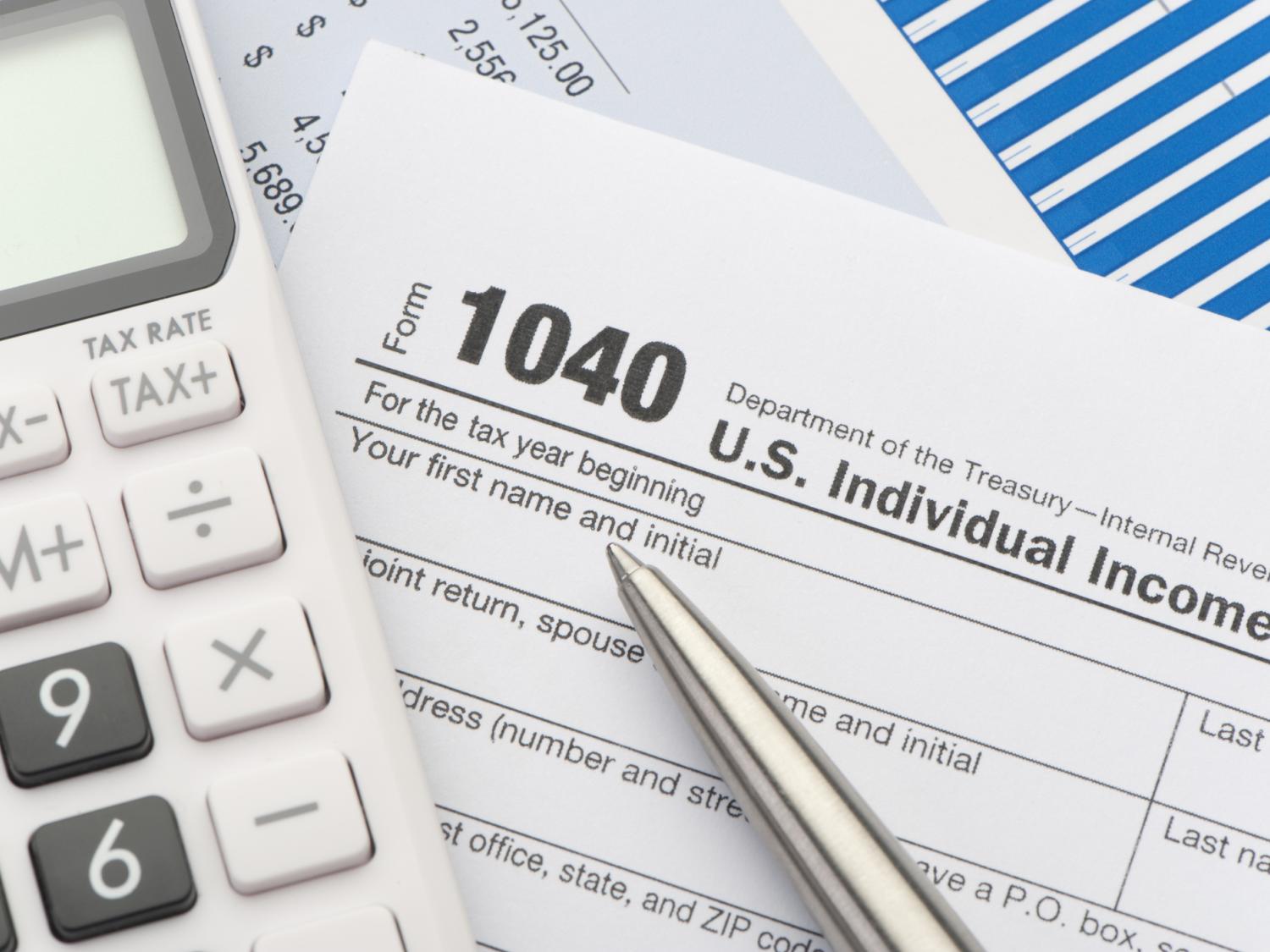 Calculator and 1040 tax form