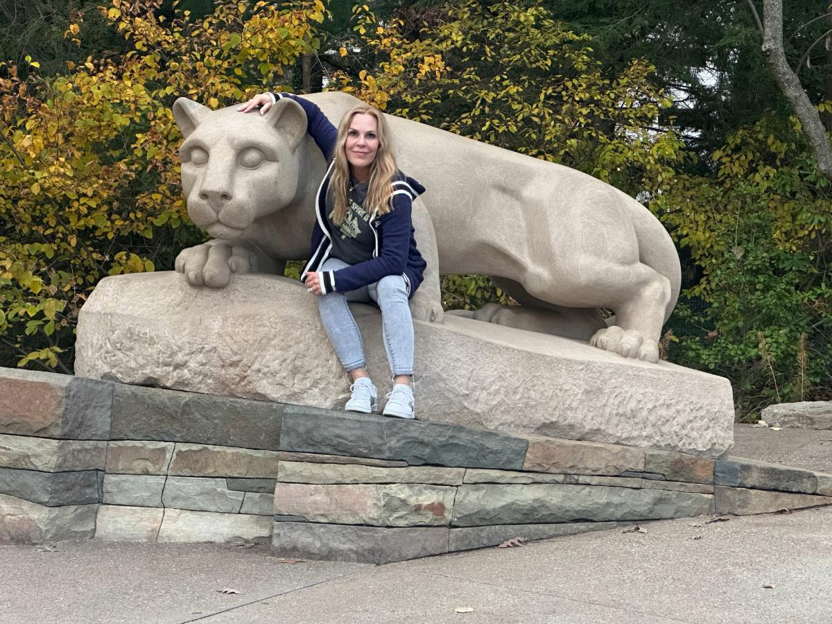 Haley Friary-Schenk posing at Lion Shrine