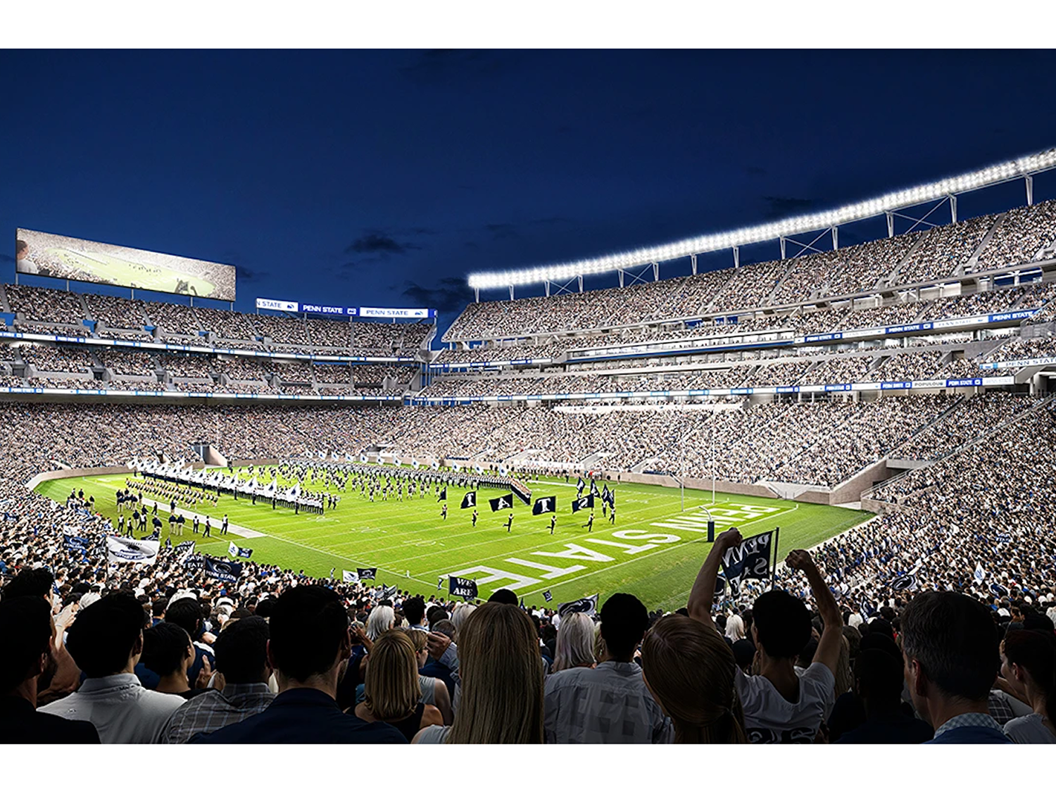 A full stadium watches a half-time show at a football game