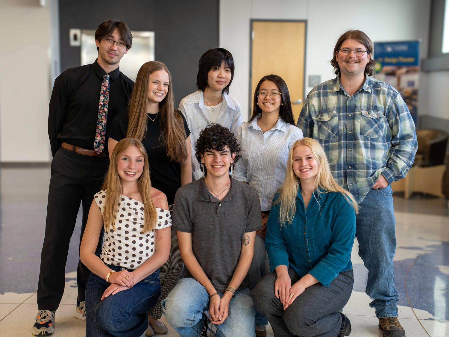 Penn State student Declan Goldhawk is surrounded by other interns at the Alaska Center for Energy and Power in Fairbanks