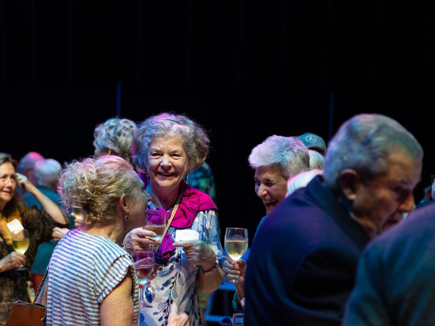 Groups of people talking and mingling